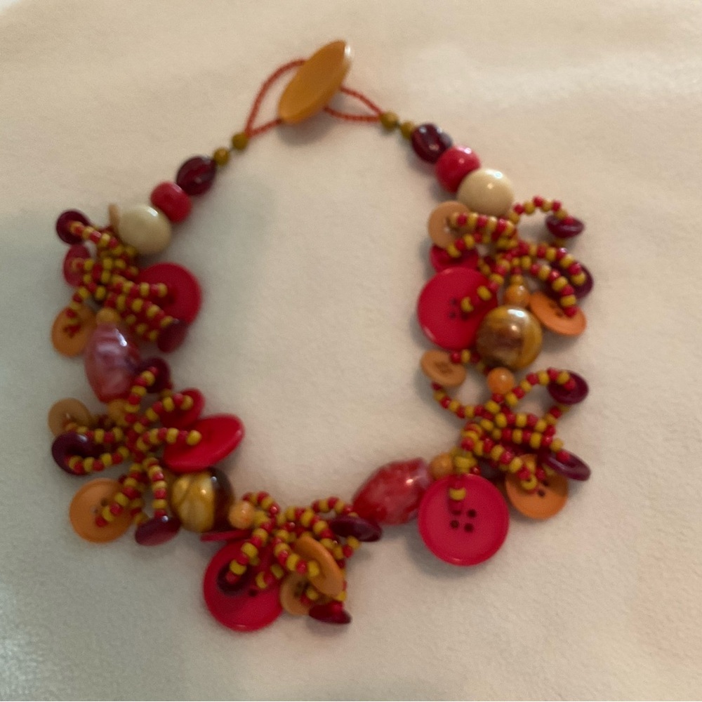 Red and Orange Bohemian Necklace with Textured Beads and buttons